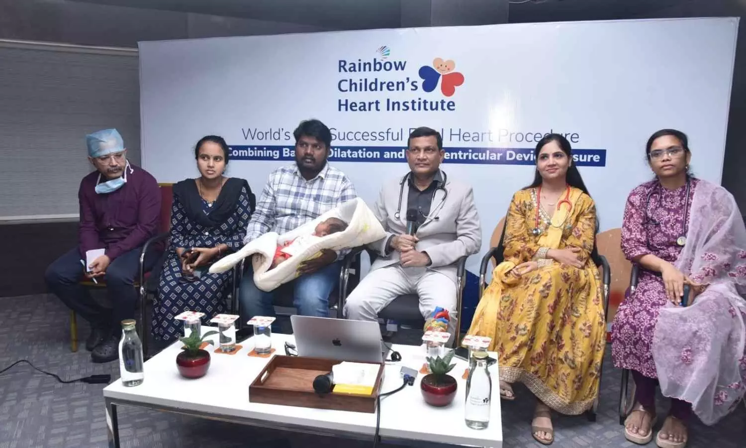 Rainbow Chilrens Heart Institute team with the baby and his parents